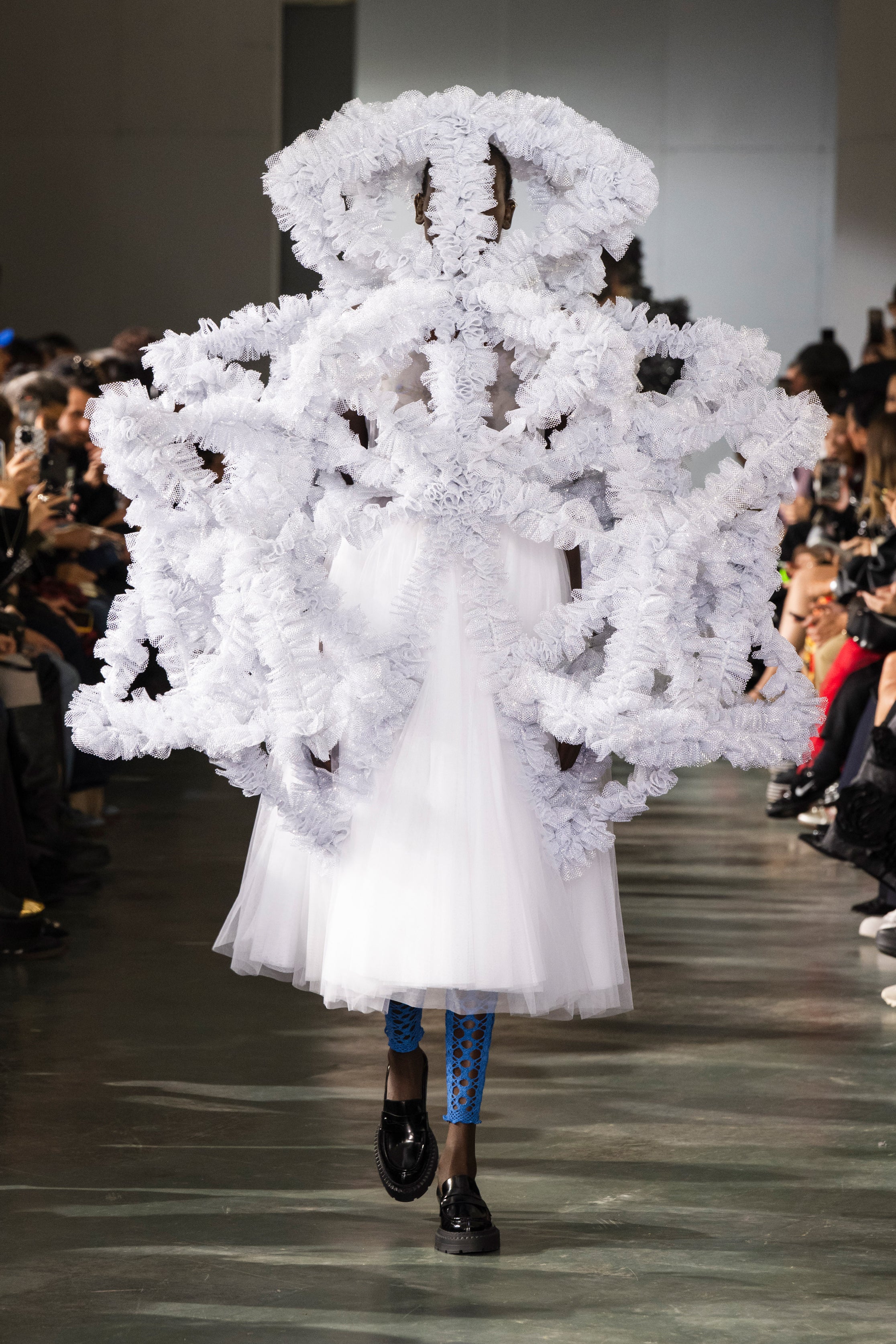 Fashion model wearing a Noir Kei Ninomiya SS26 outfit