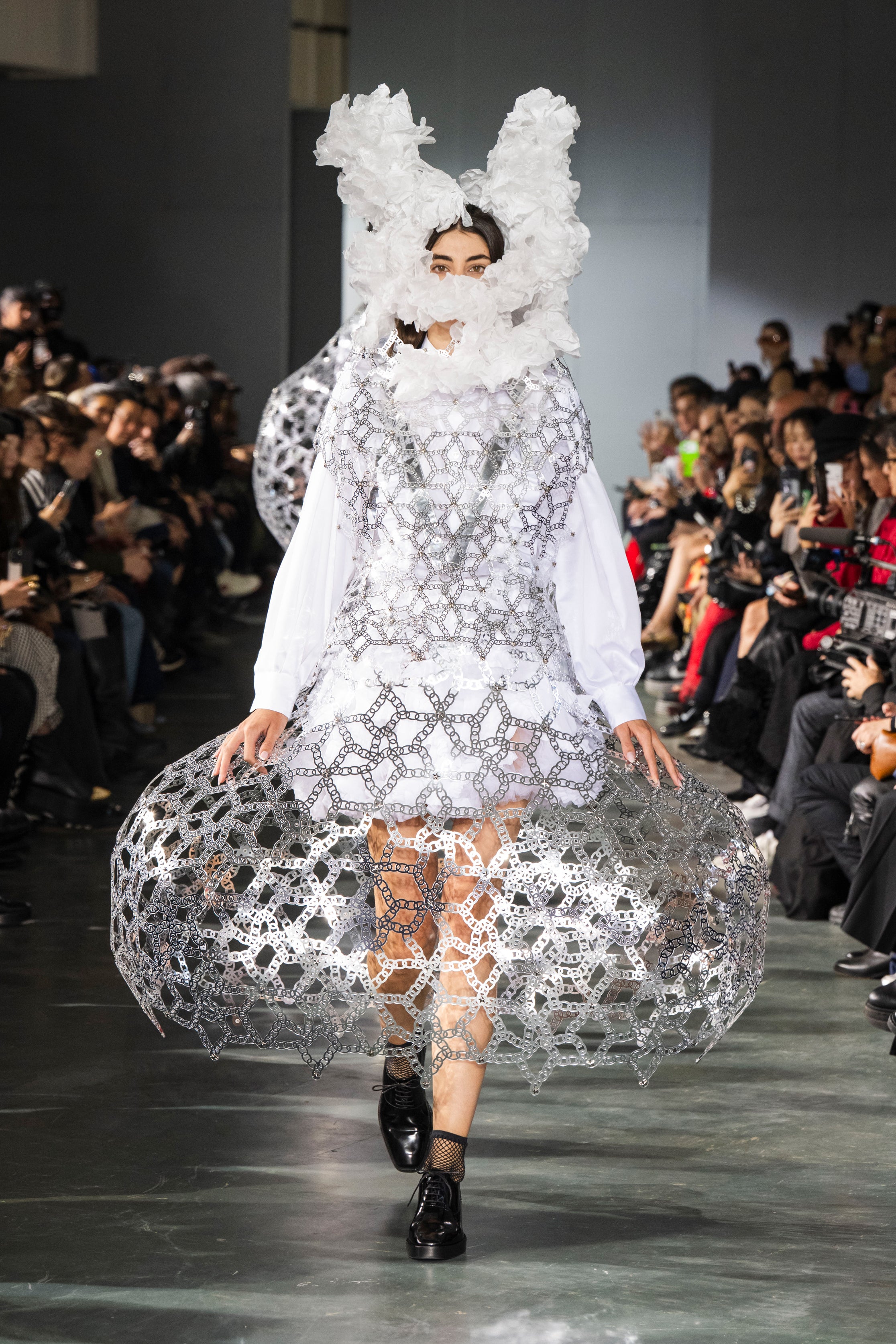 Fashion model wearing a Noir Kei Ninomiya SS26 outfit