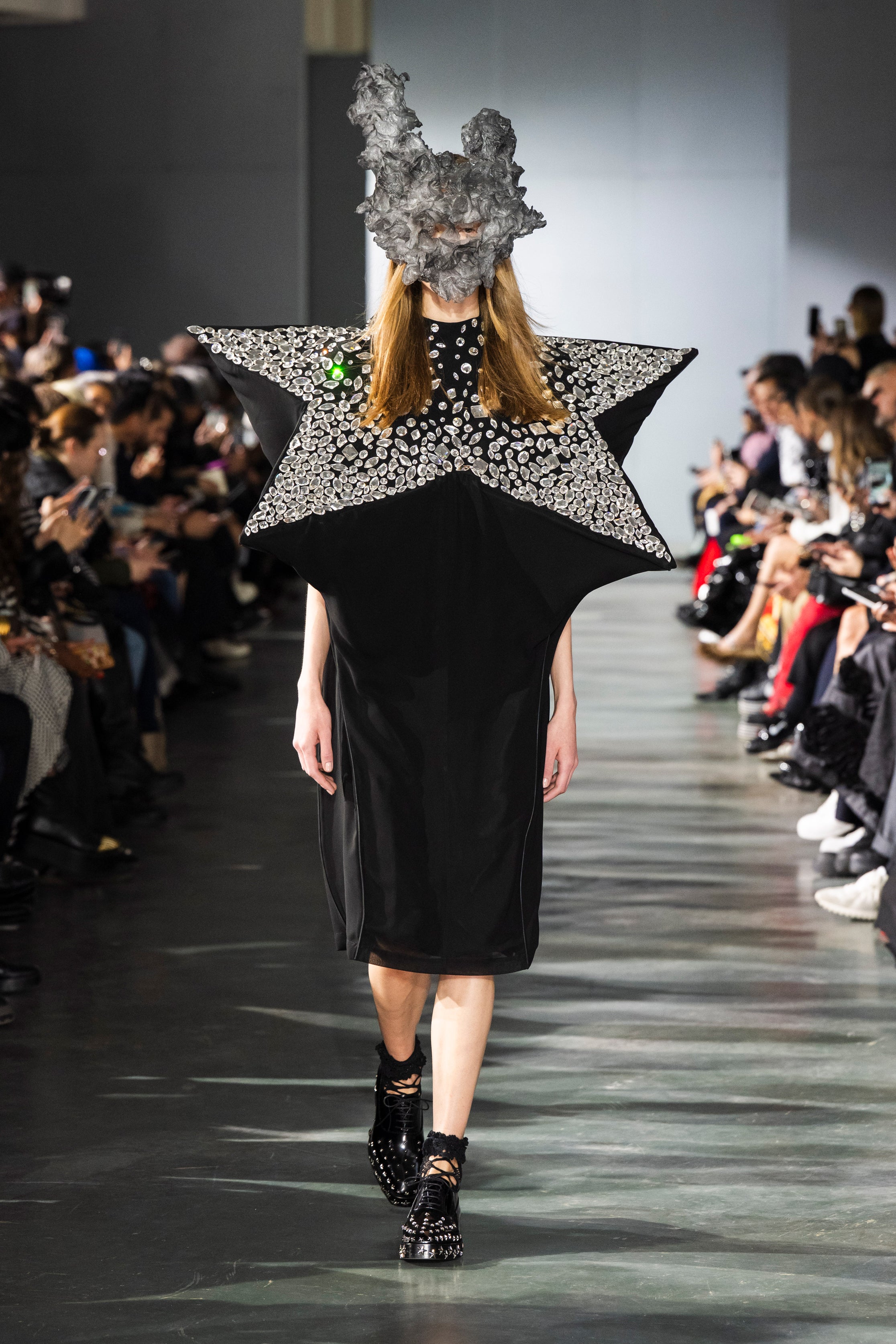 Fashion model wearing a Noir Kei Ninomiya SS26 outfit