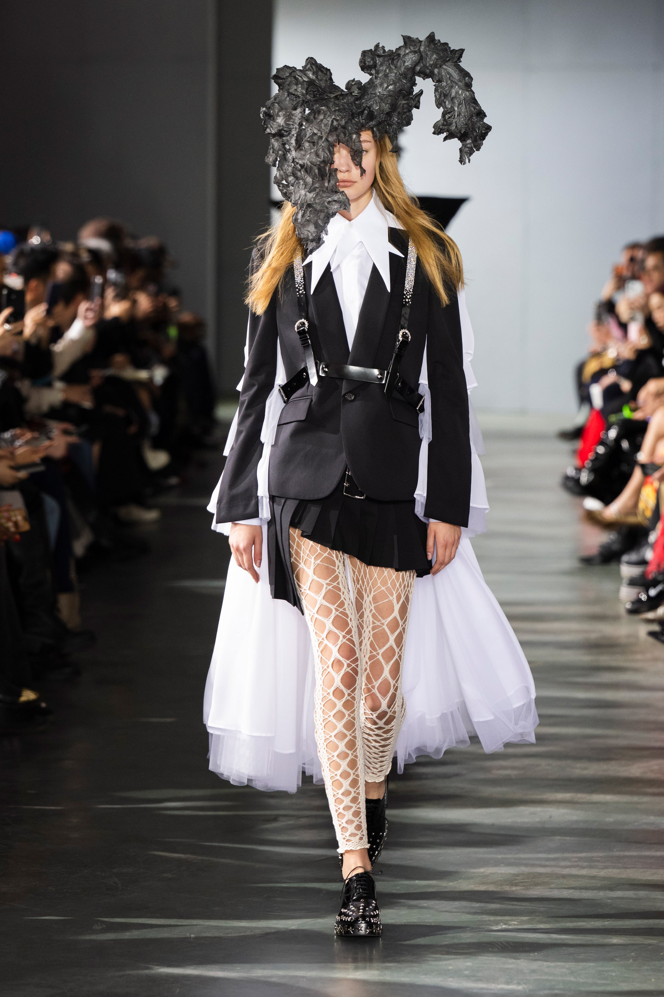 Fashion model wearing a Noir Kei Ninomiya SS26 outfit