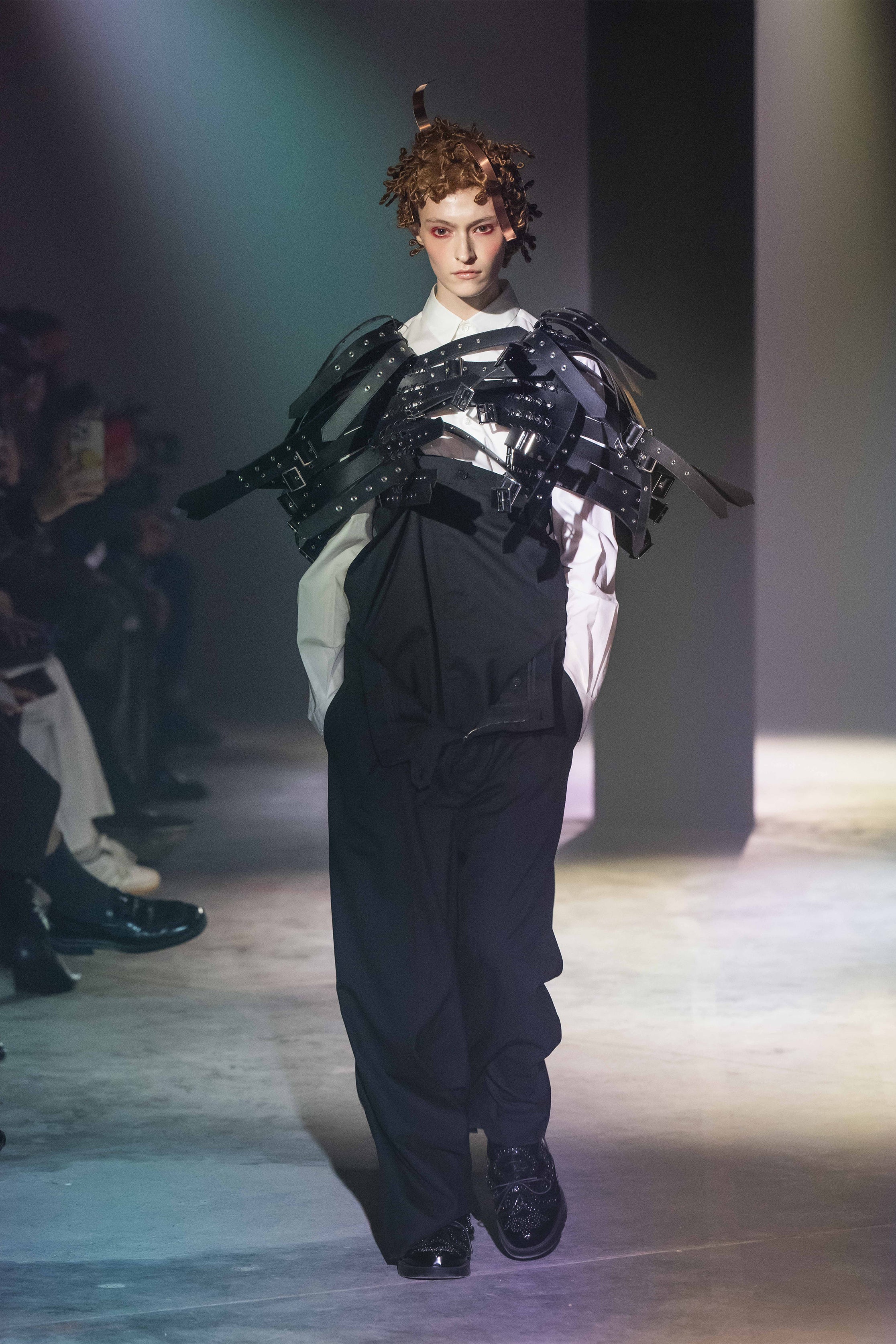 Fashion model wearing a NOIR KEI NINOMIYA SS25 outfit