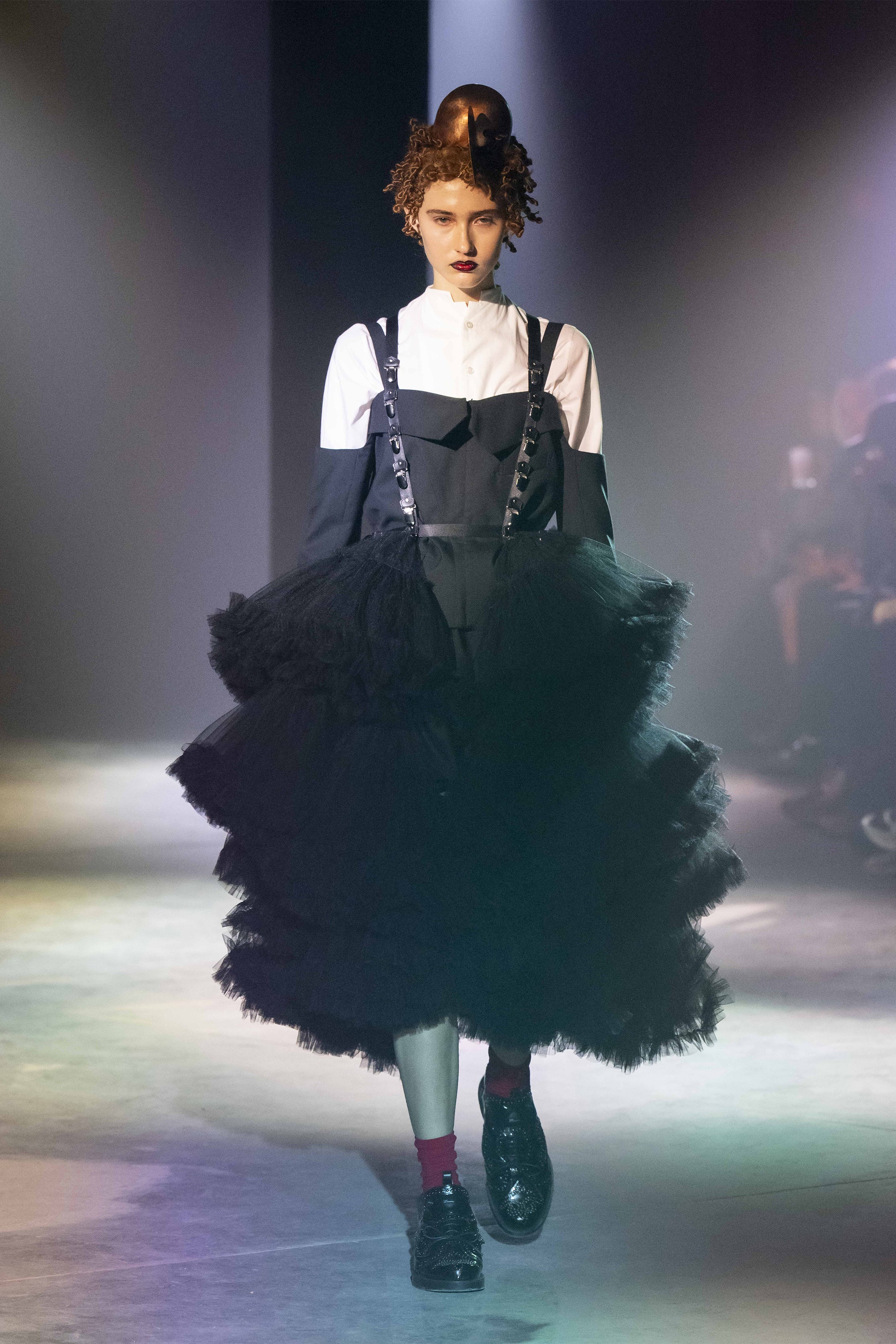 Fashion model wearing a NOIR KEI NINOMIYA SS25 outfit