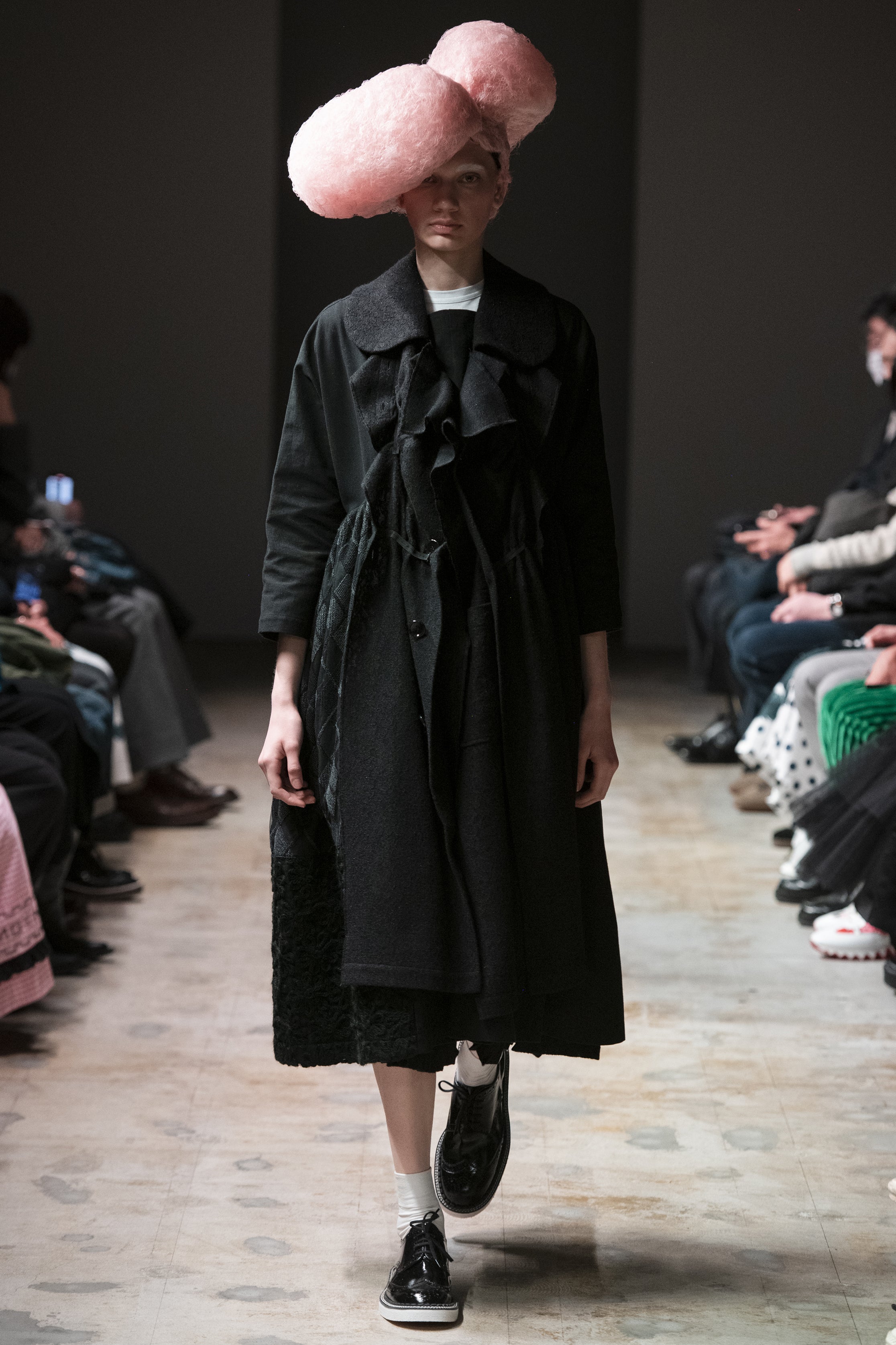 Fashion model wearing a tao AW24 outfit