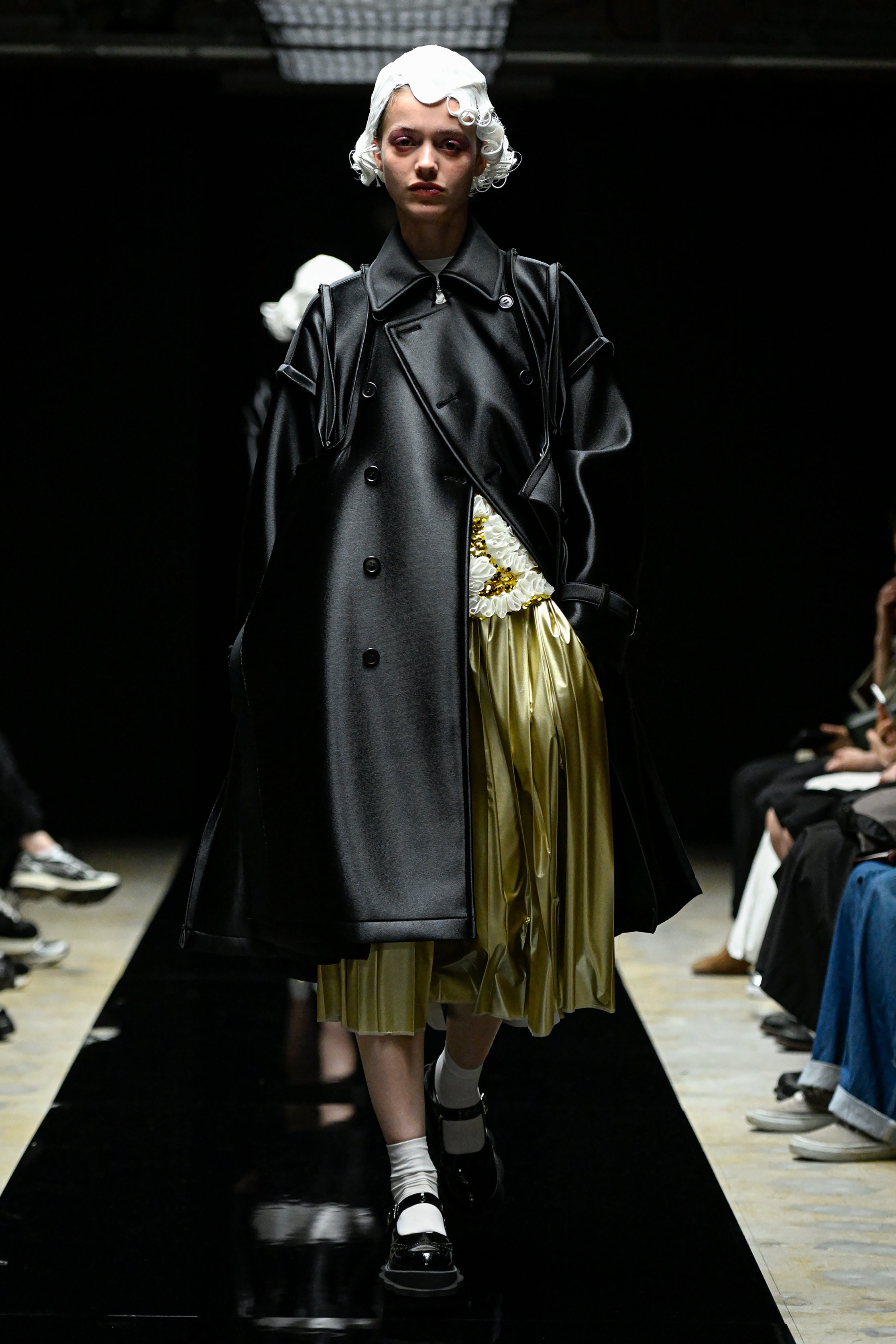 Fashion model wearing a tao AW25 outfit