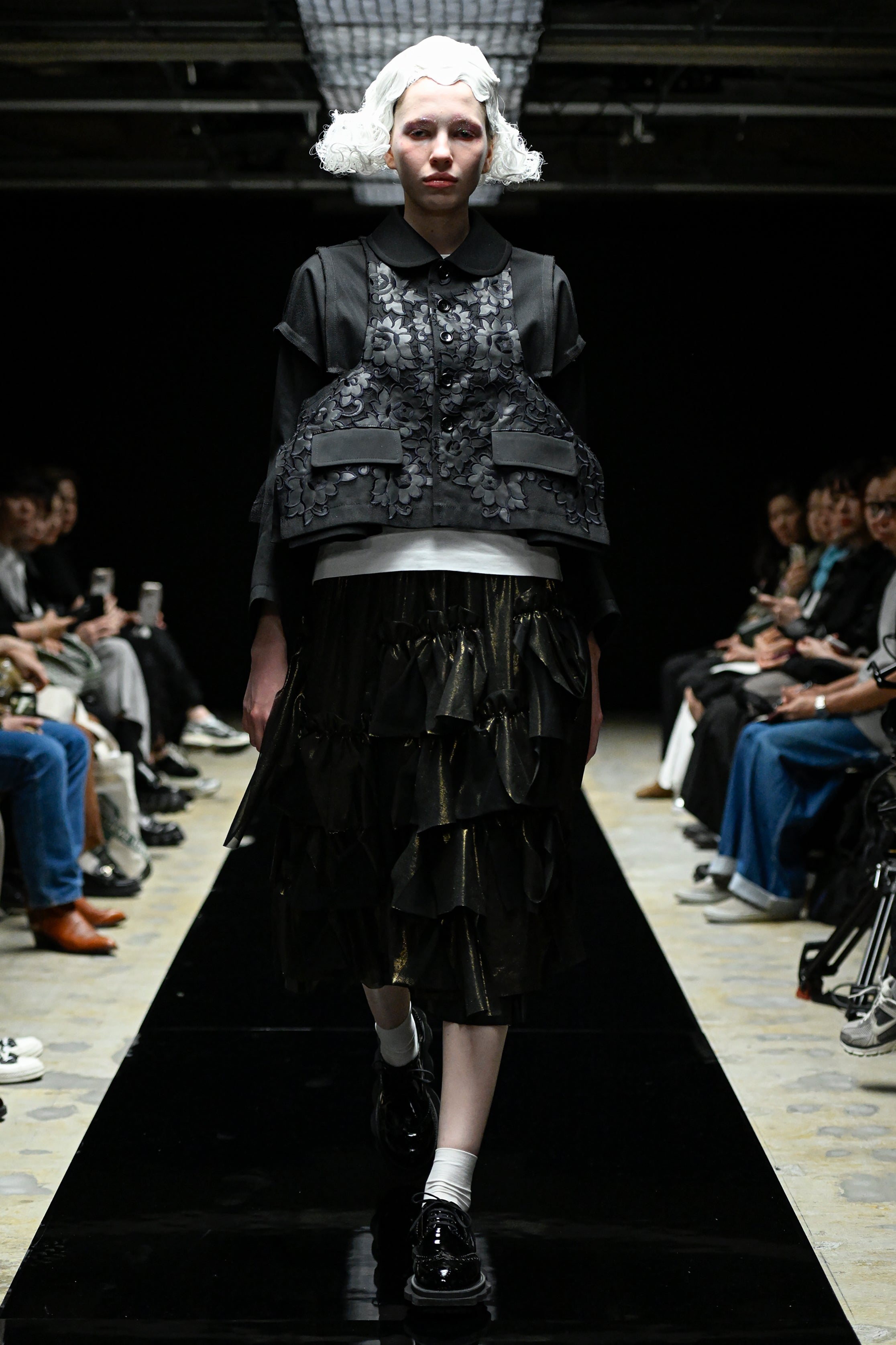 Fashion model wearing a tao AW25 outfit