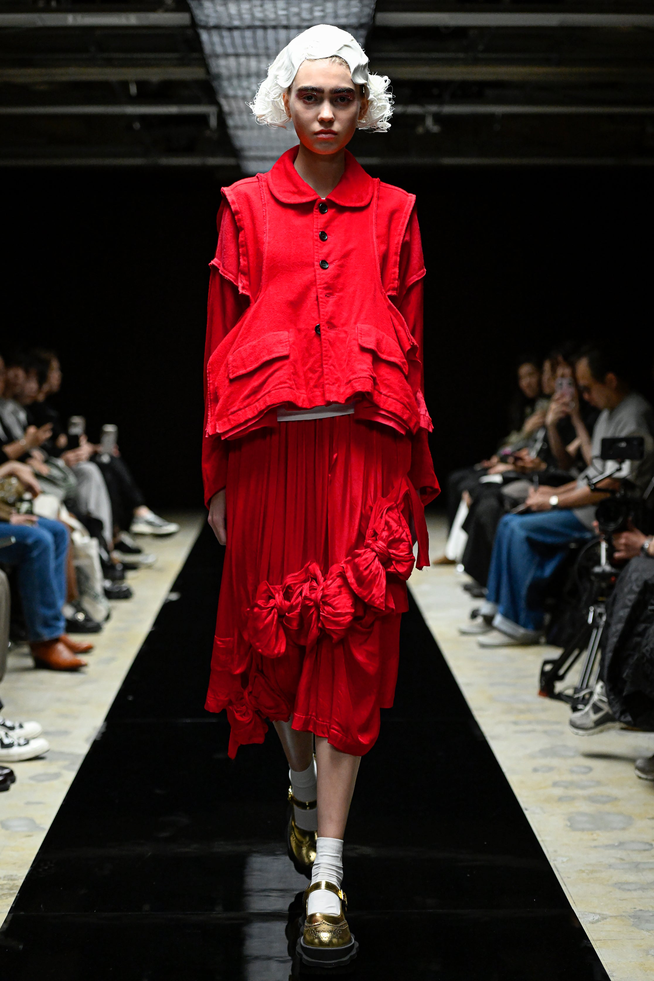 Fashion model wearing a tao AW25 outfit