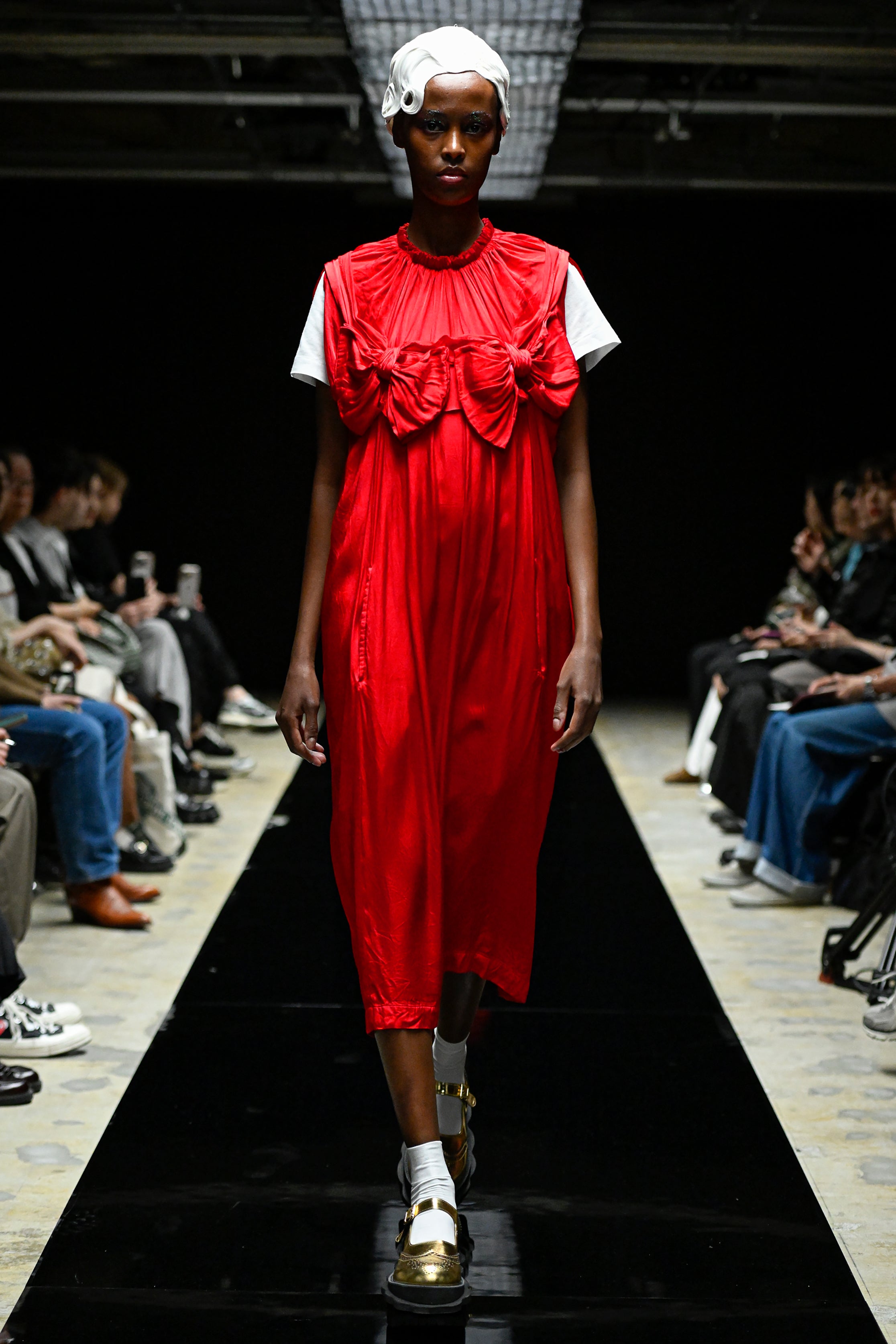 Fashion model wearing a tao AW25 outfit