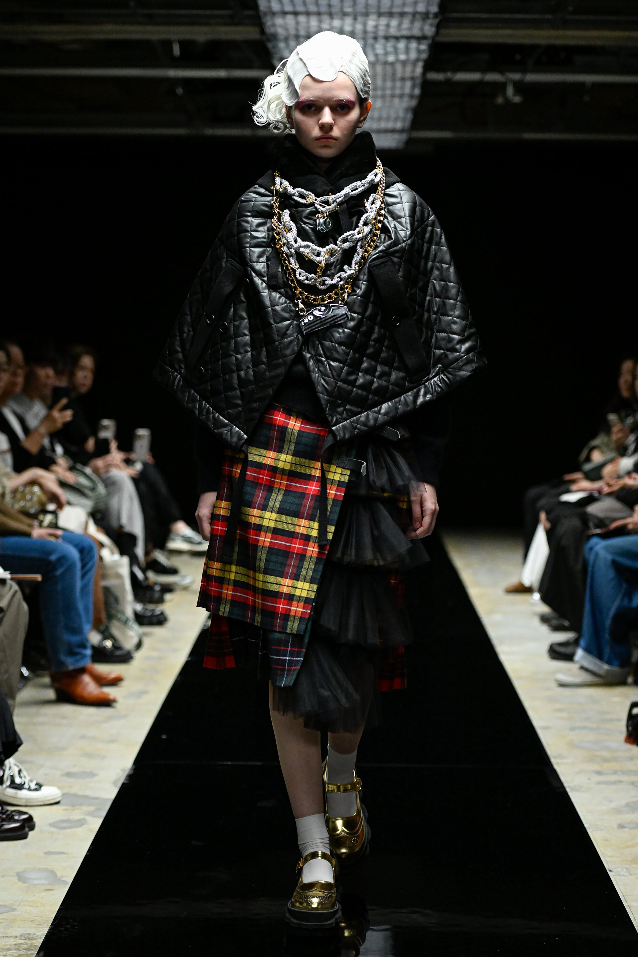 Fashion model wearing a tao AW25 outfit