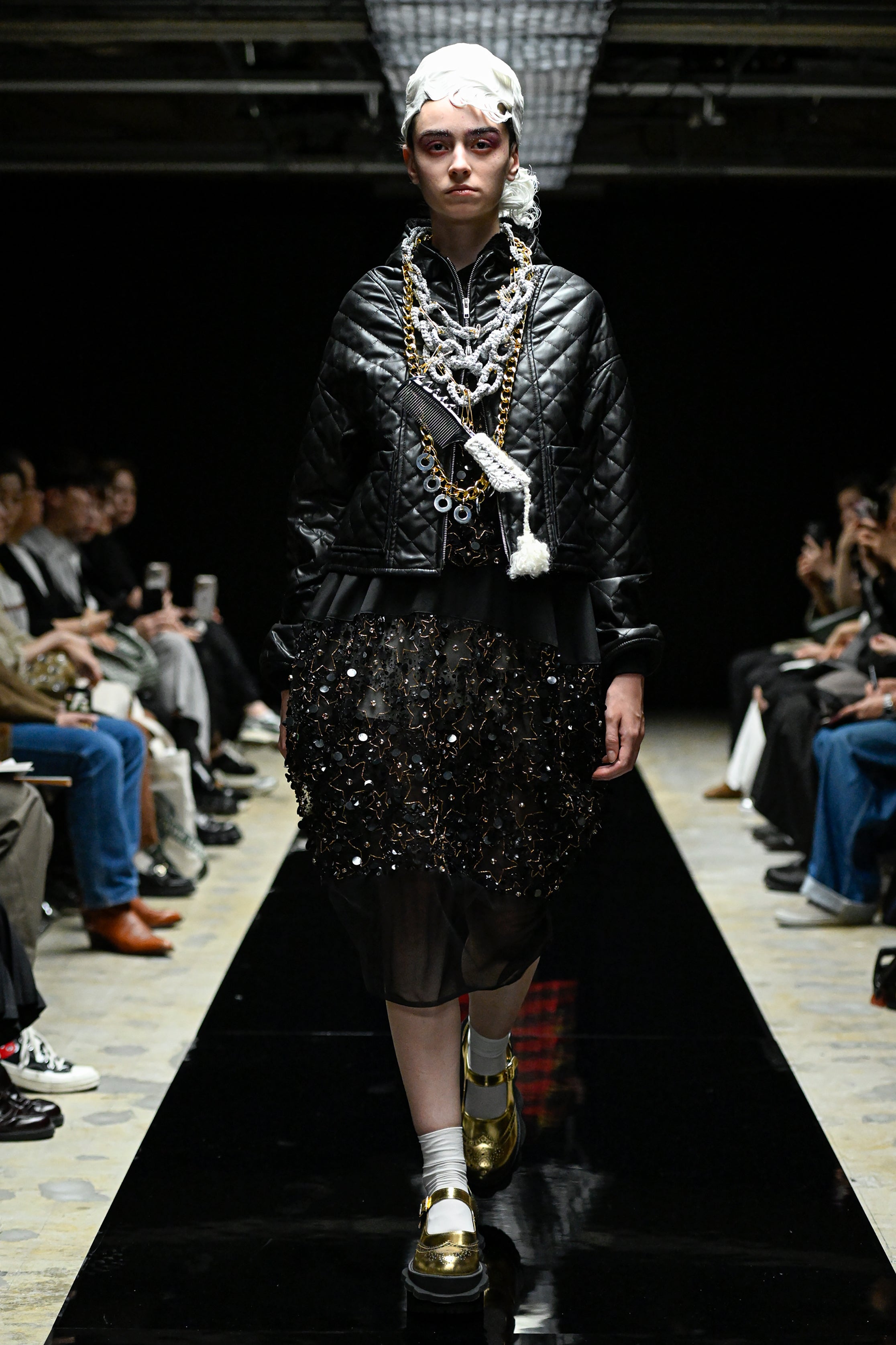 Fashion model wearing a tao AW25 outfit