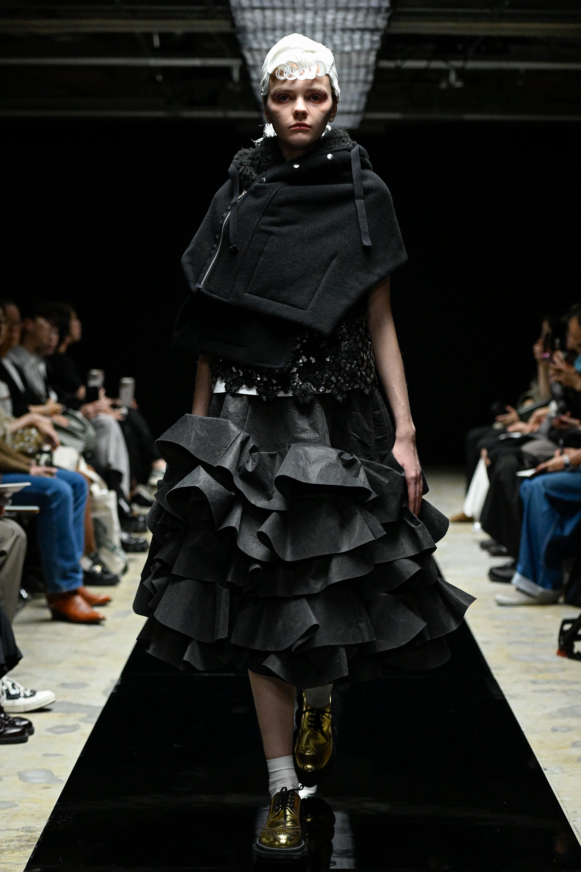 Fashion model wearing a tao AW25 outfit