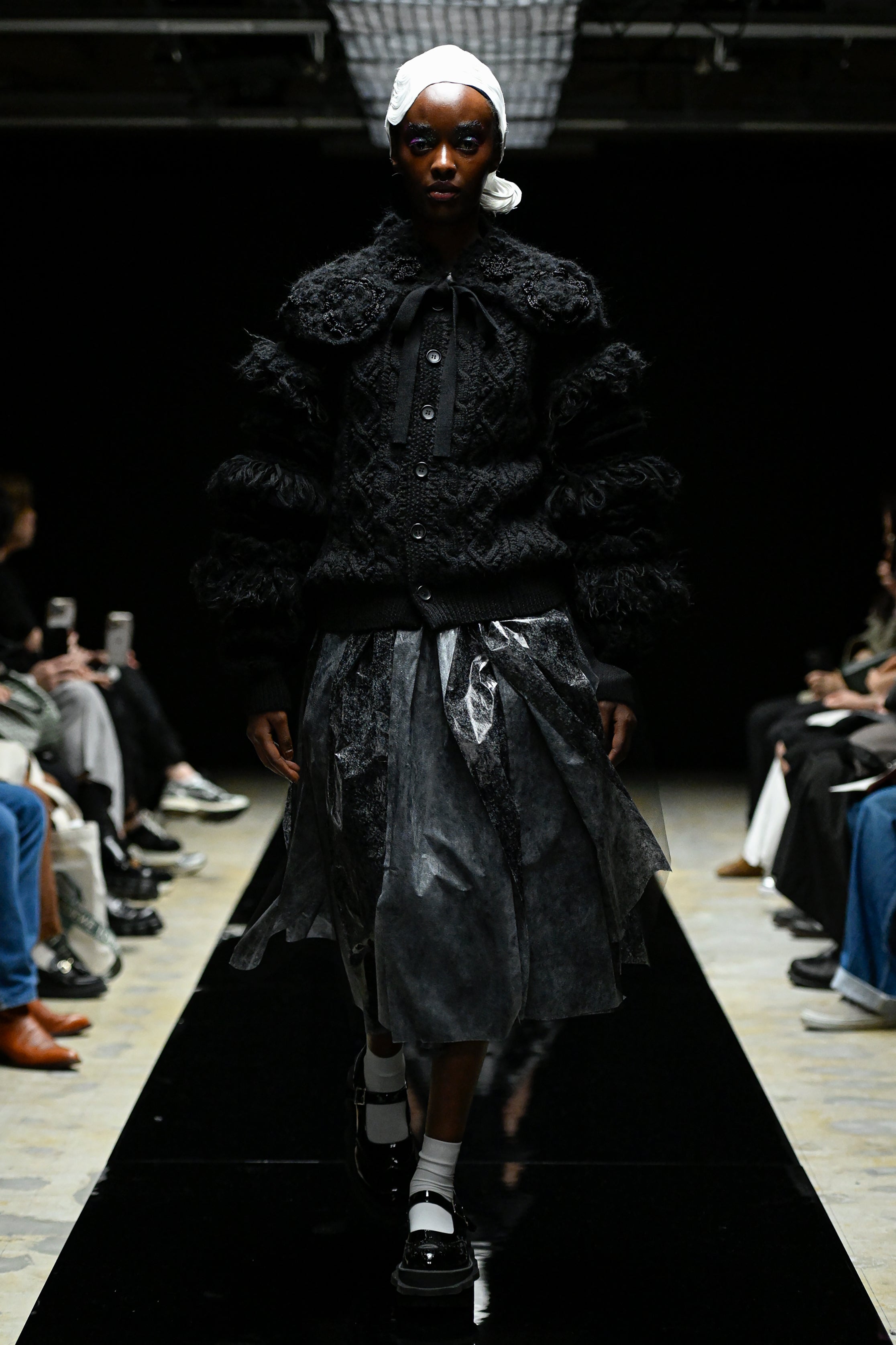 Fashion model wearing a tao AW25 outfit