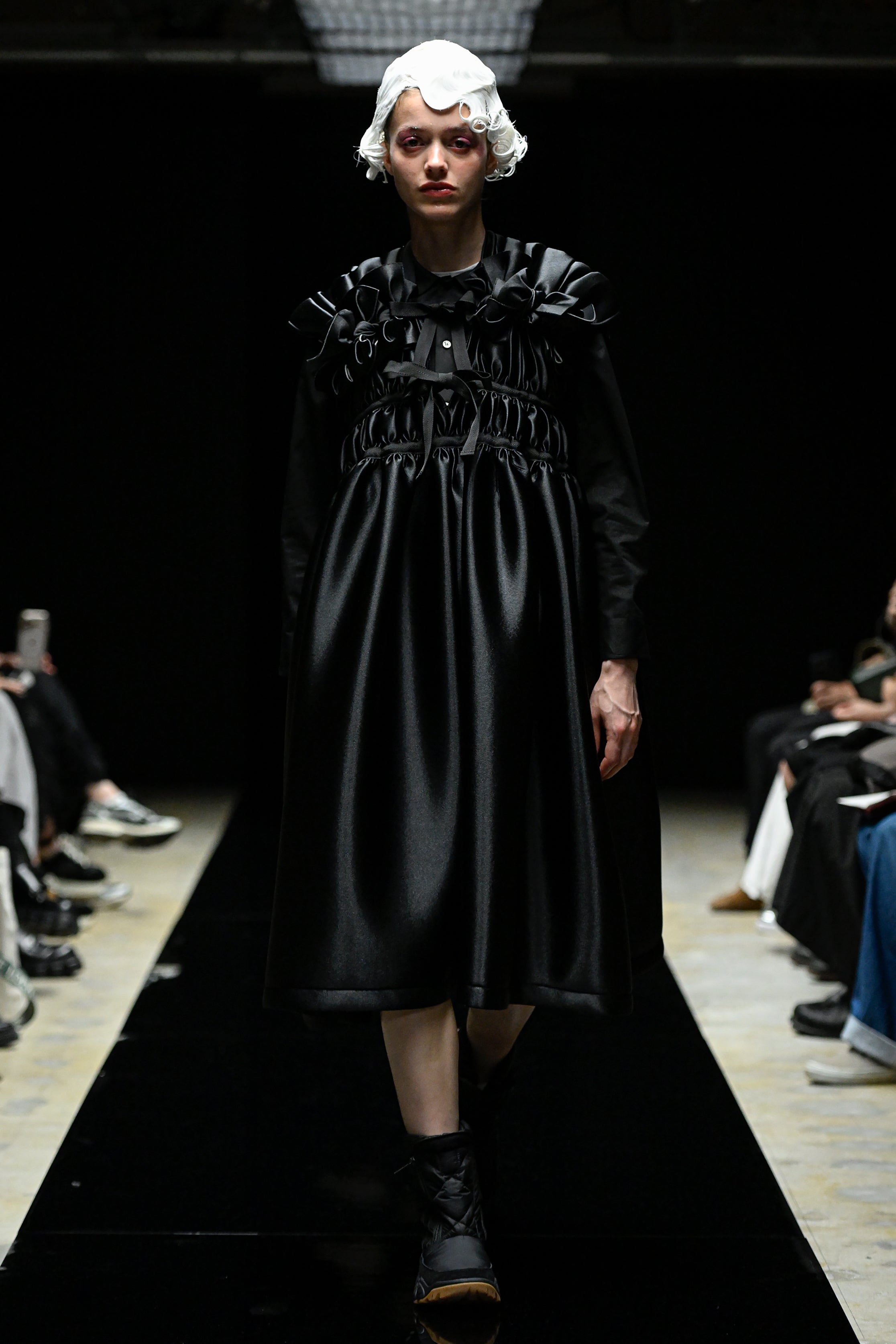 Fashion model wearing a tao AW25 outfit