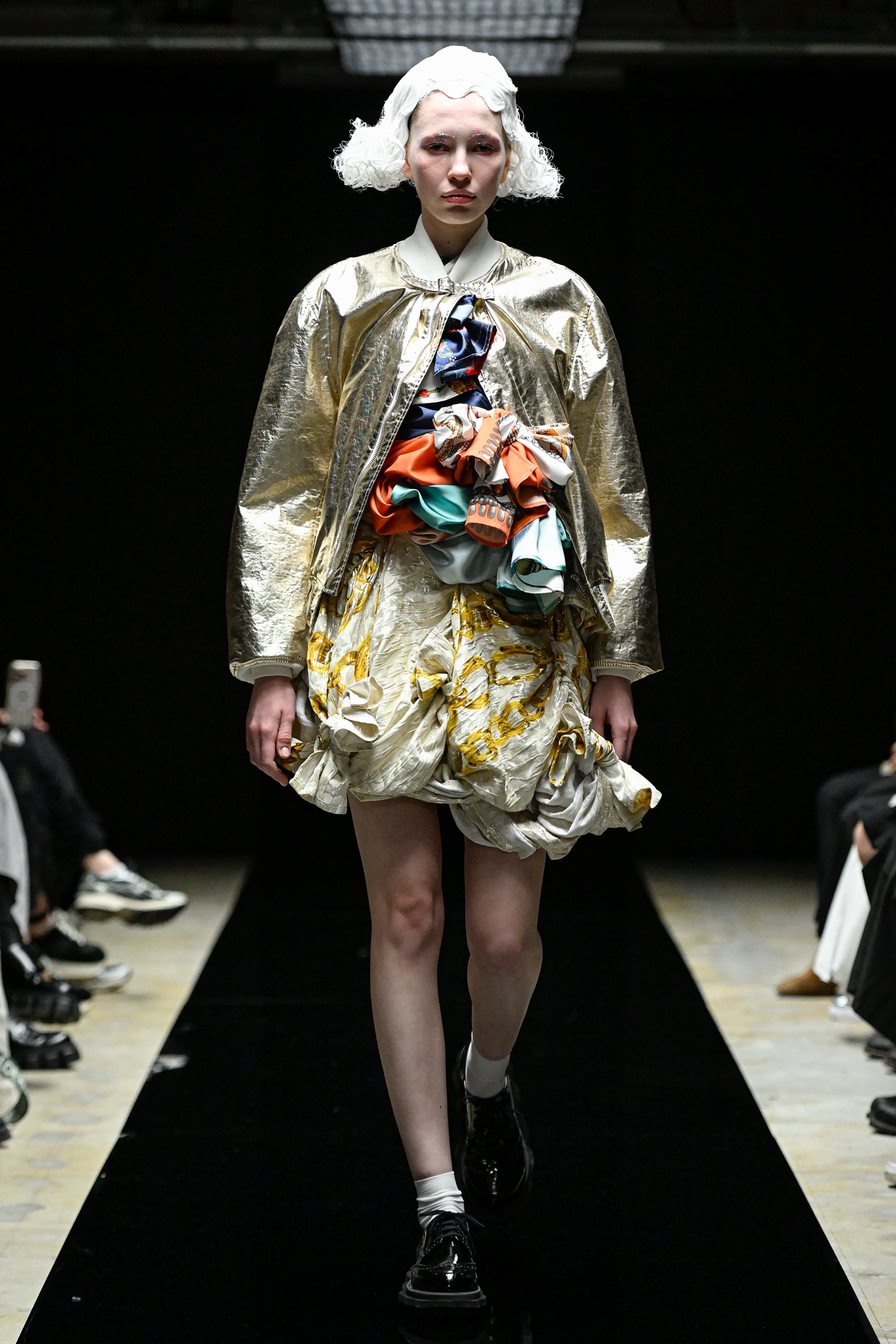 Fashion model wearing a tao AW25 outfit