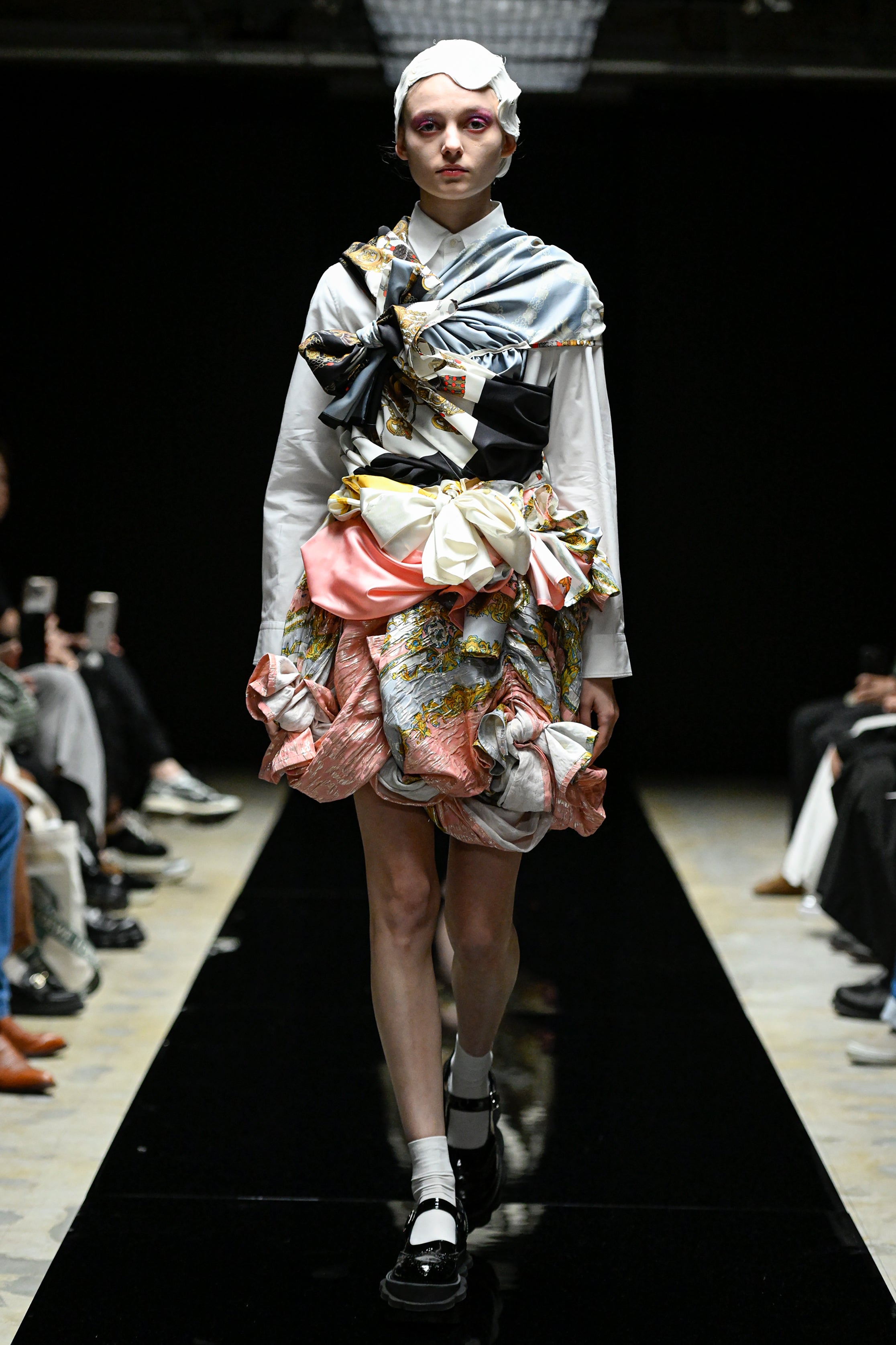 Fashion model wearing a tao AW25 outfit