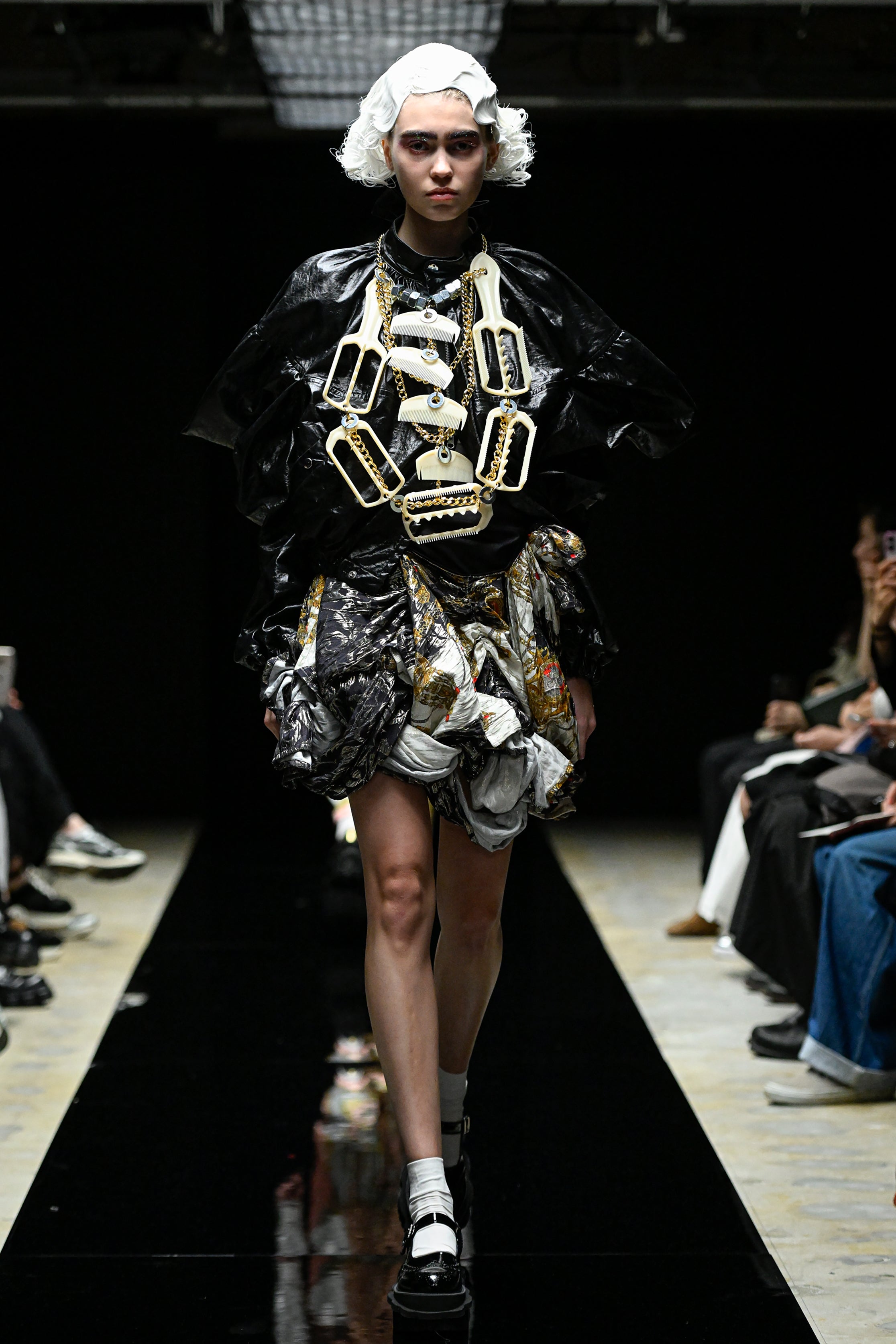 Fashion model wearing a tao AW25 outfit