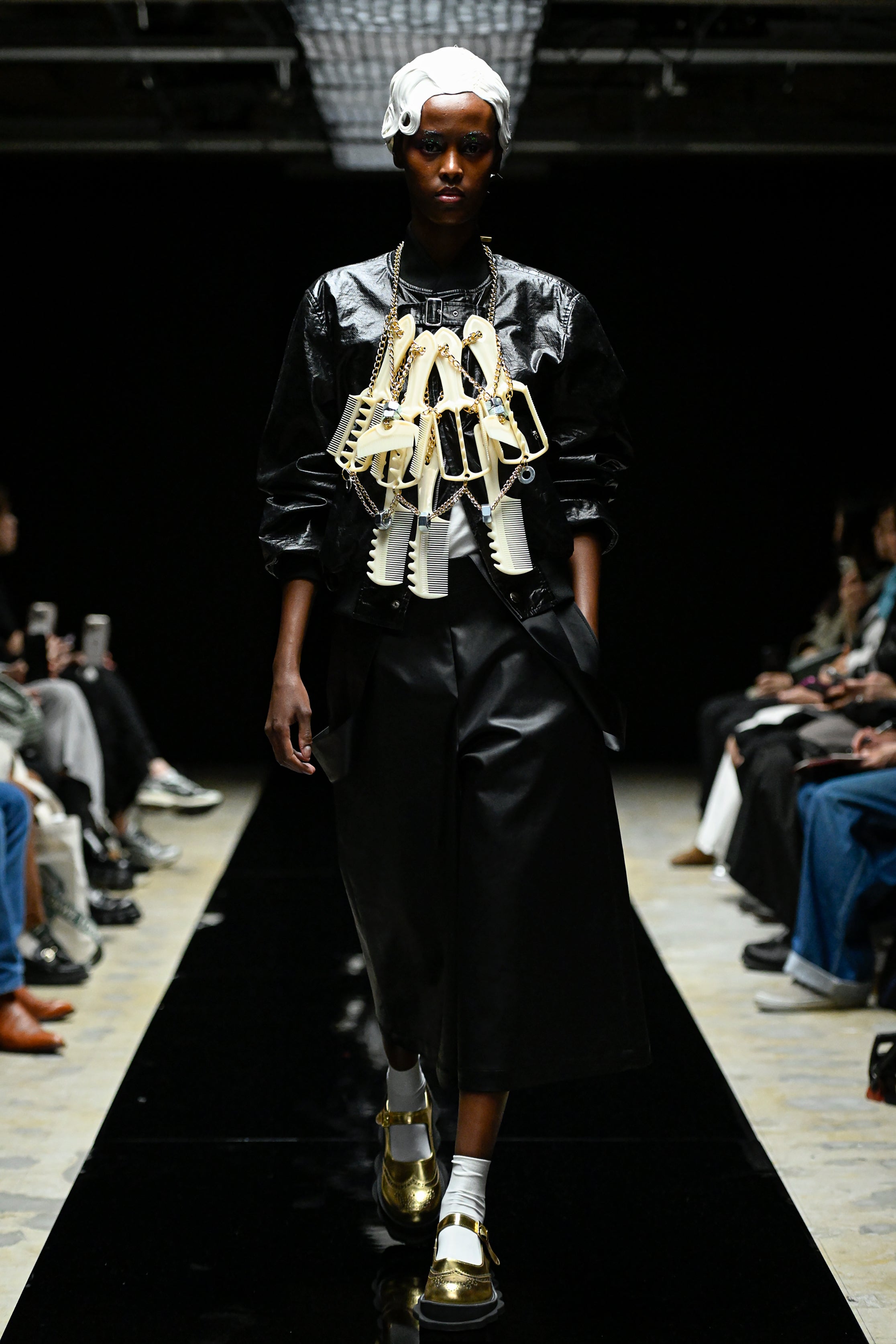 Fashion model wearing a tao AW25 outfit