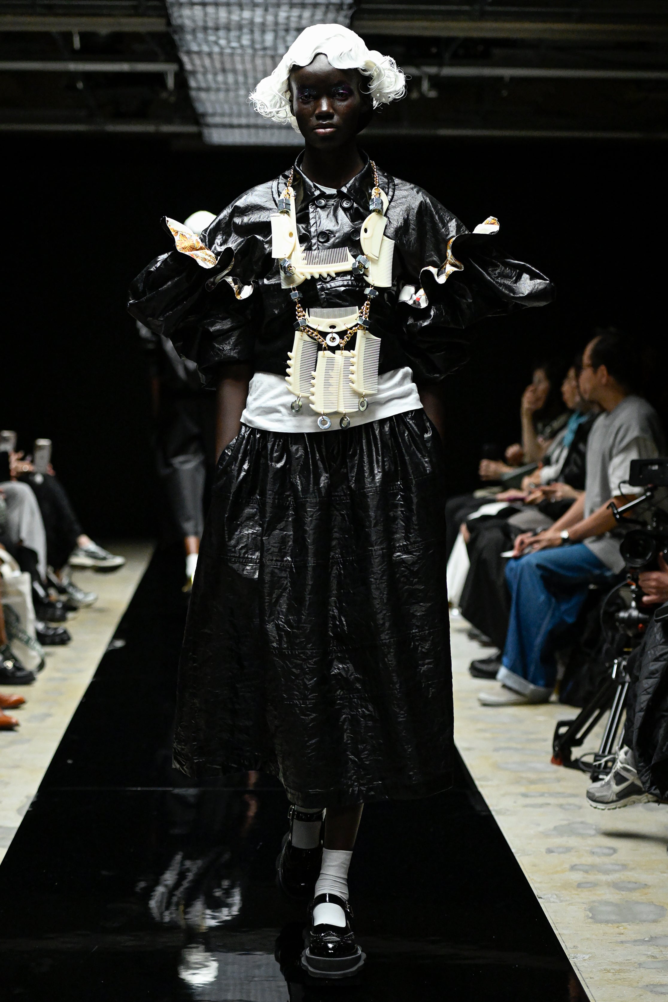 Fashion model wearing a tao AW25 outfit