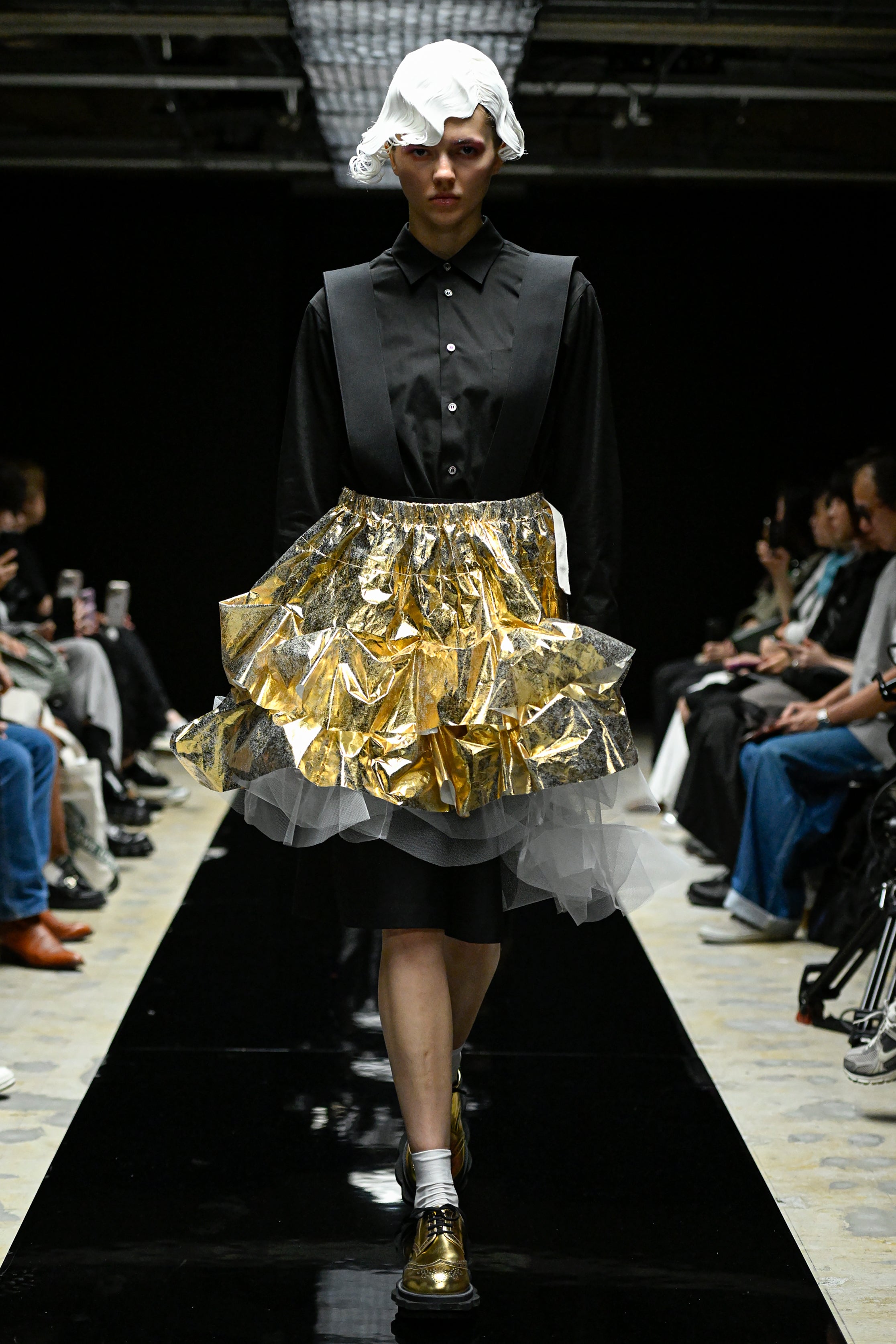 Fashion model wearing a tao AW25 outfit