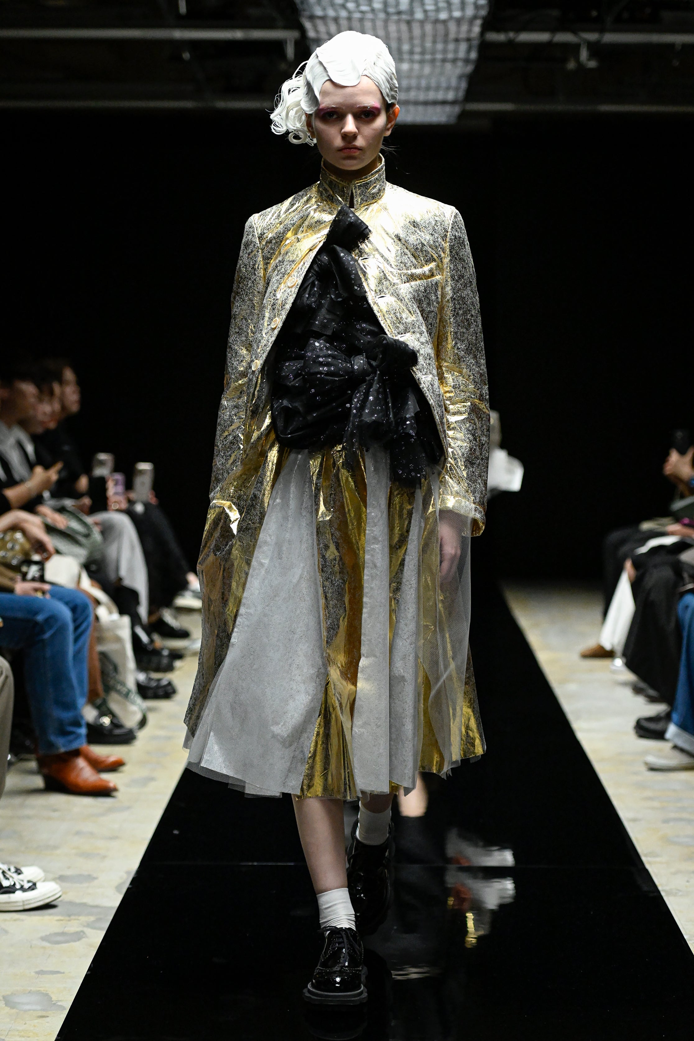 Fashion model wearing a tao AW25 outfit