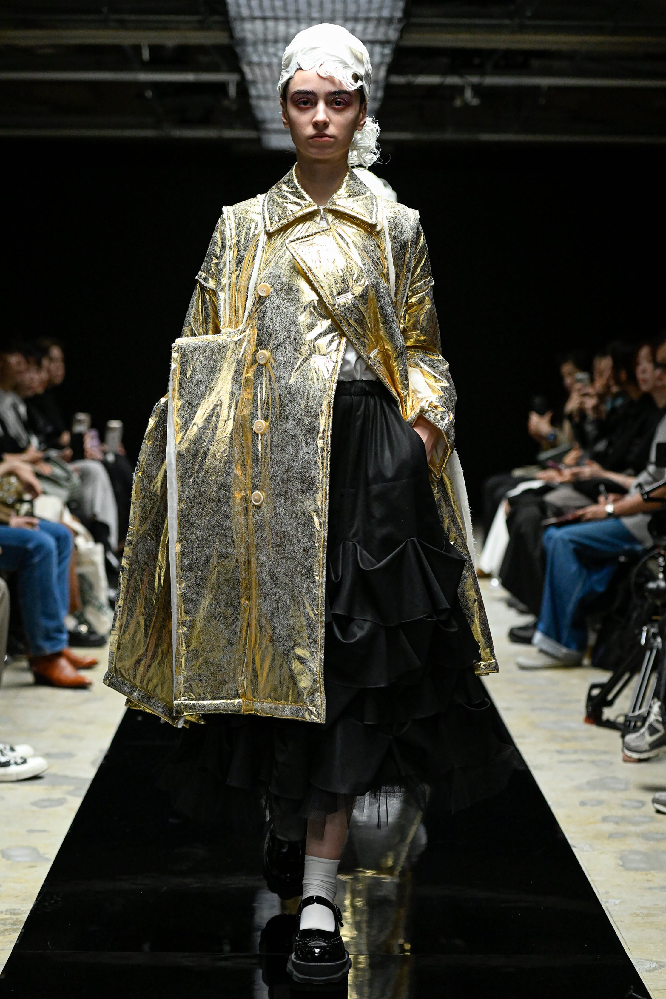 Fashion model wearing a tao AW25 outfit