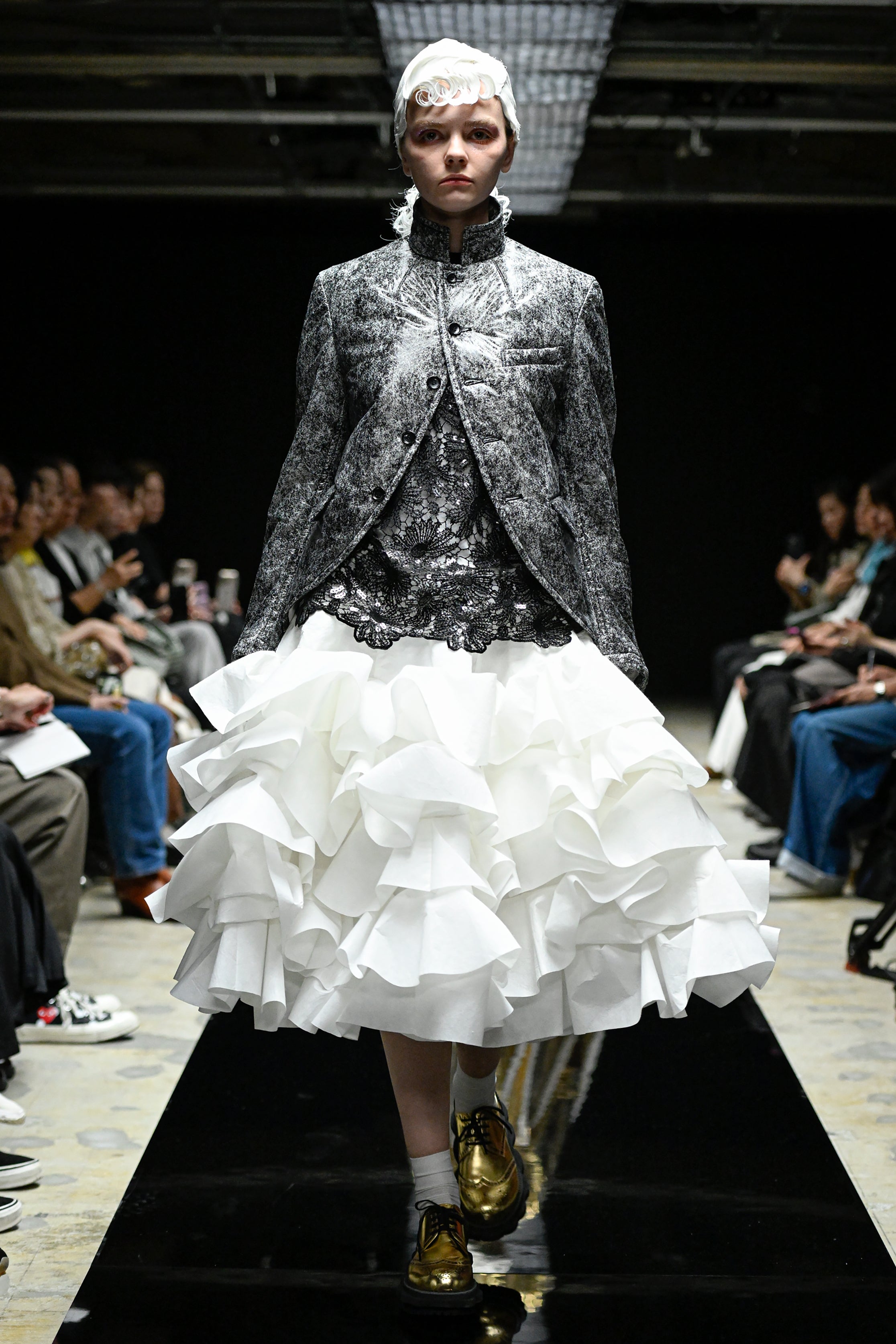 Fashion model wearing a tao AW25 outfit