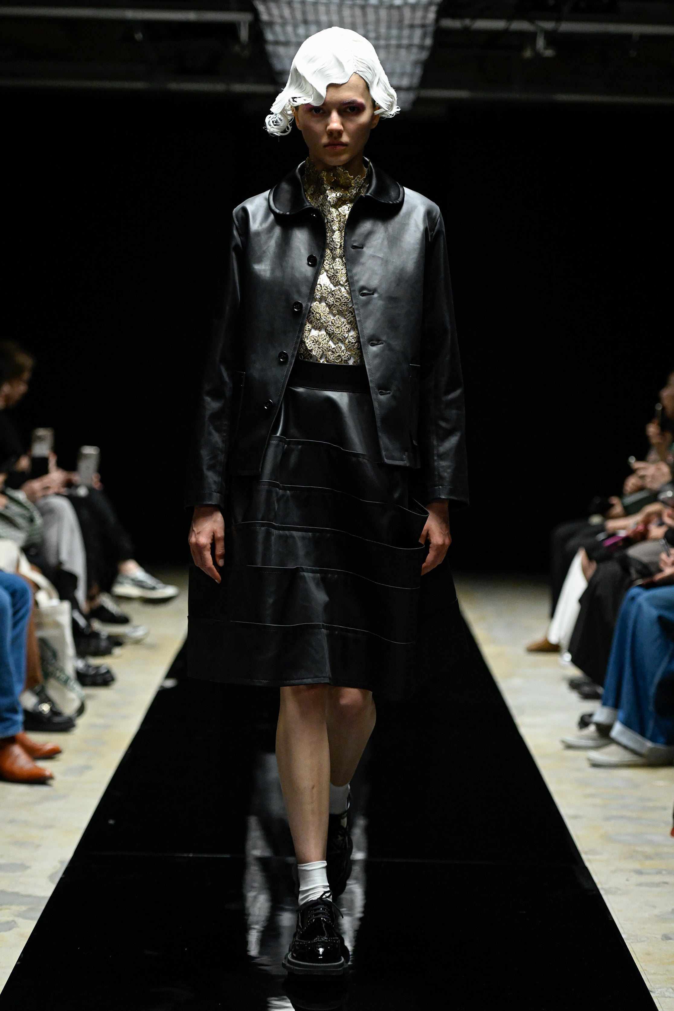 Fashion model wearing a tao AW25 outfit