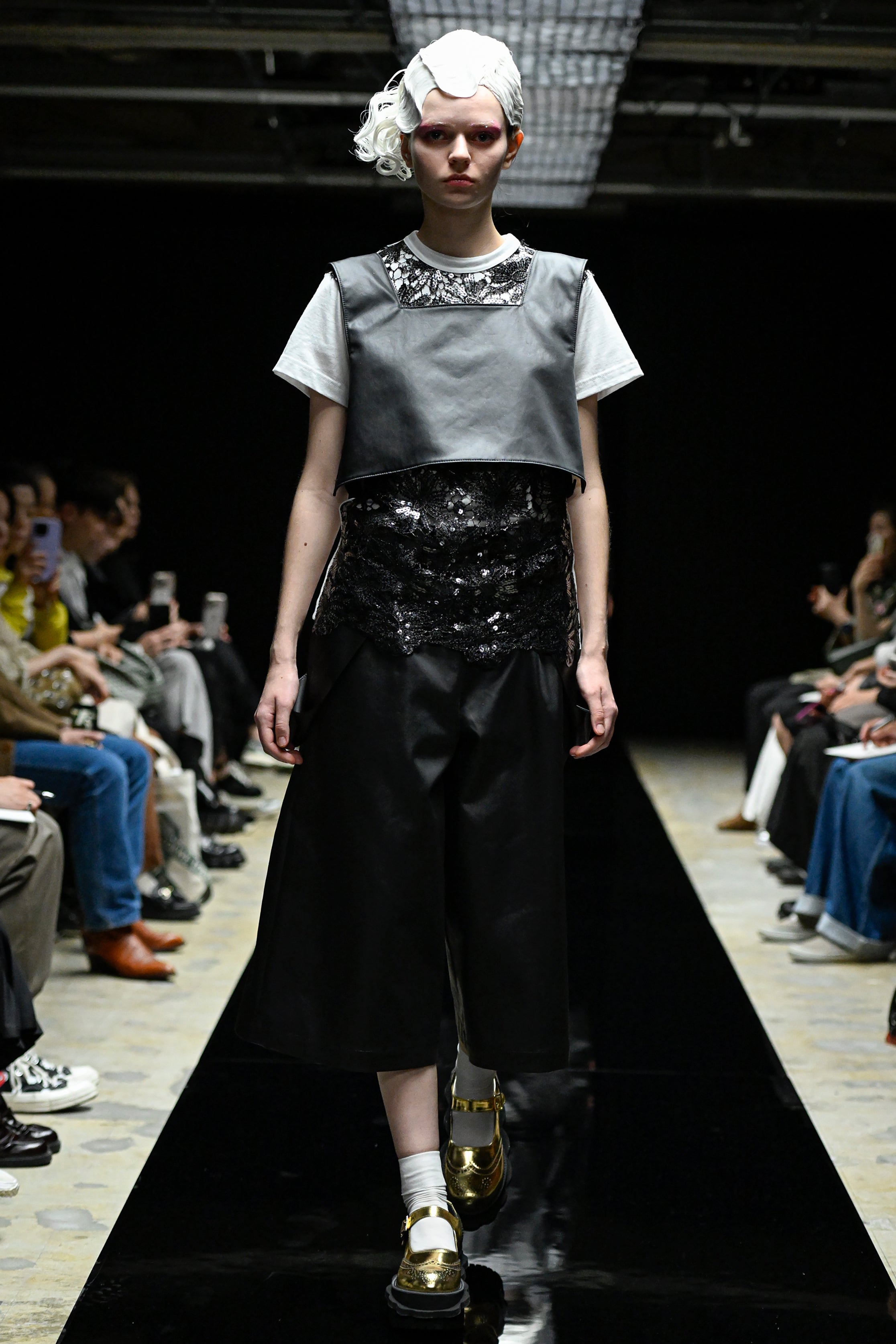 Fashion model wearing a tao AW25 outfit