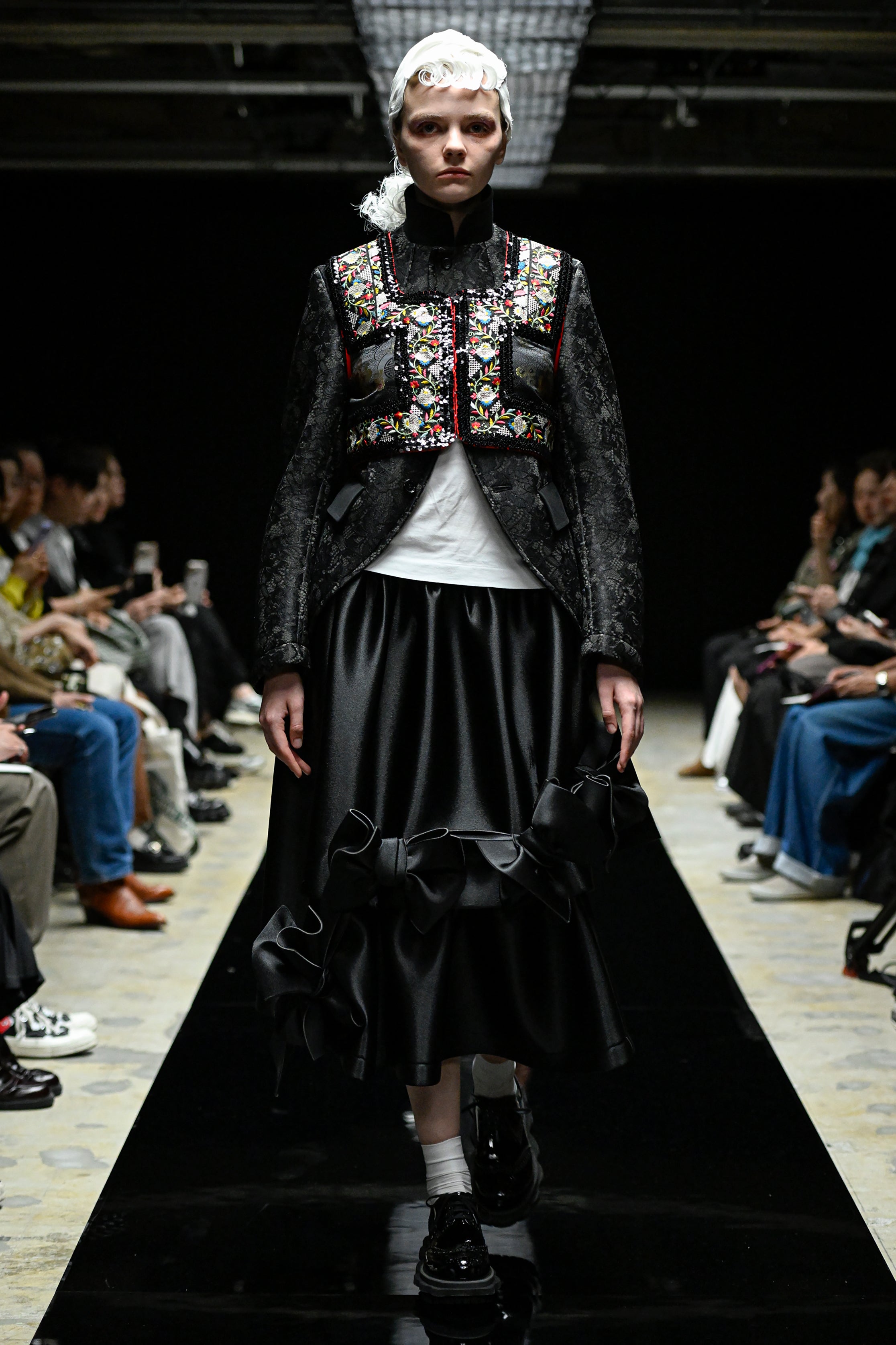 Fashion model wearing a tao AW25 outfit
