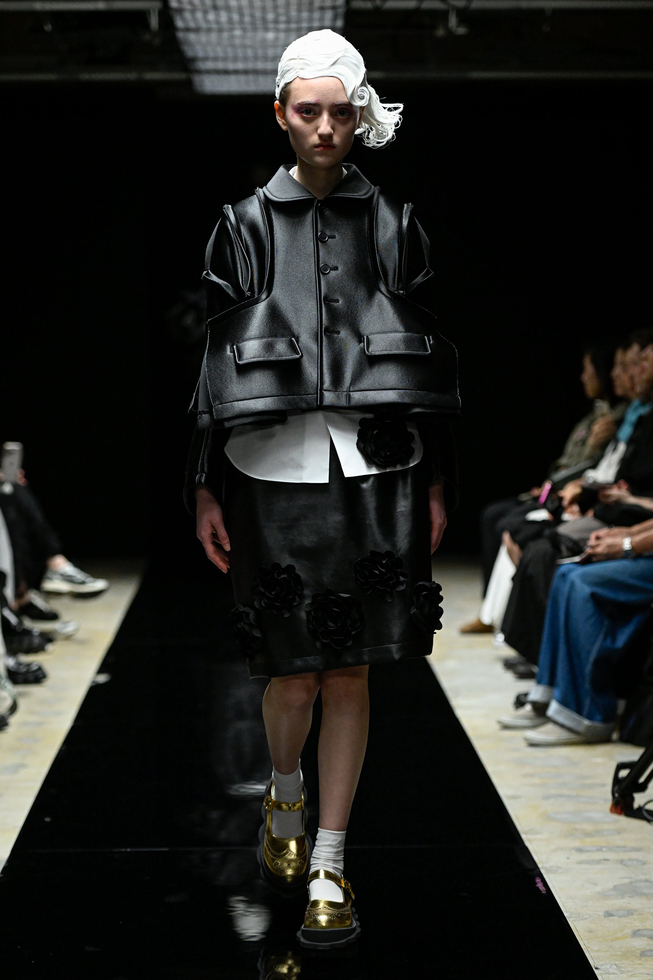 Fashion model wearing a tao AW25 outfit