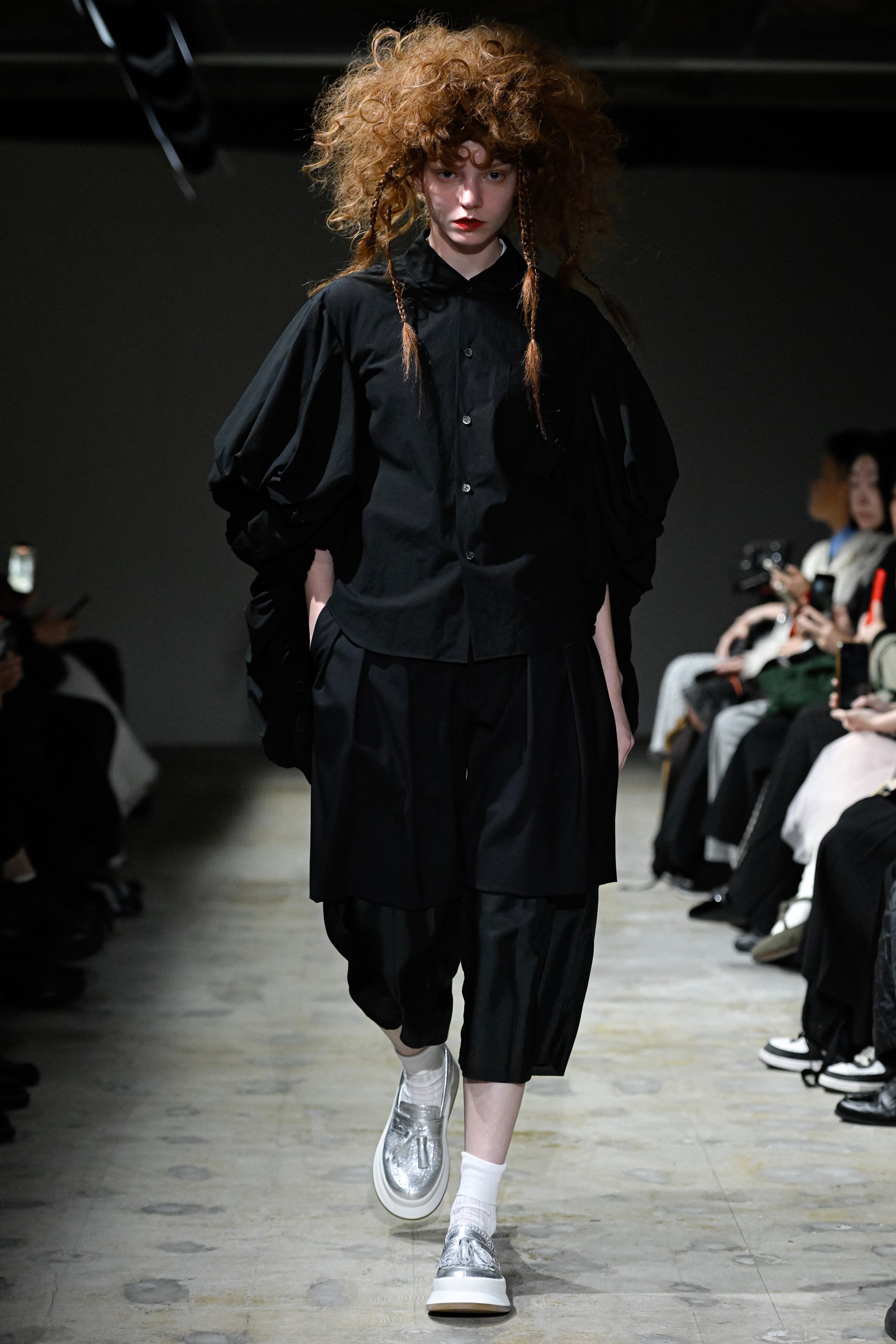 Fashion model wearing a tao SS26 outfit