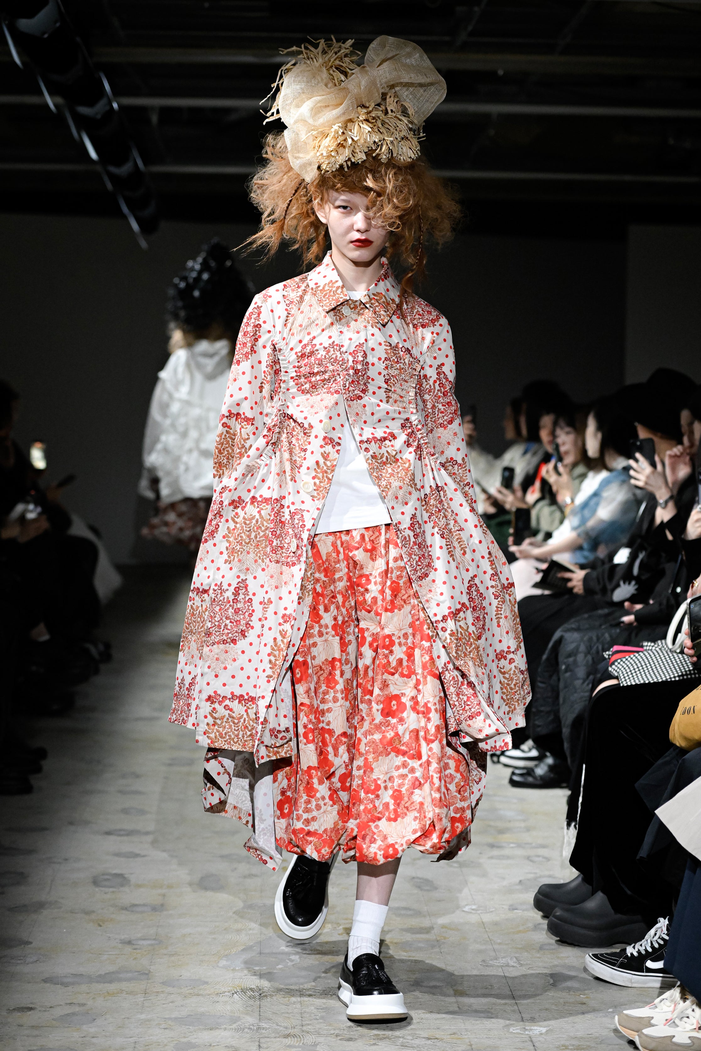 Fashion model wearing a tao SS26 outfit